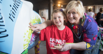 Children paint Rainbow Trust Children’s Charity’s cow for CowParade Surrey image